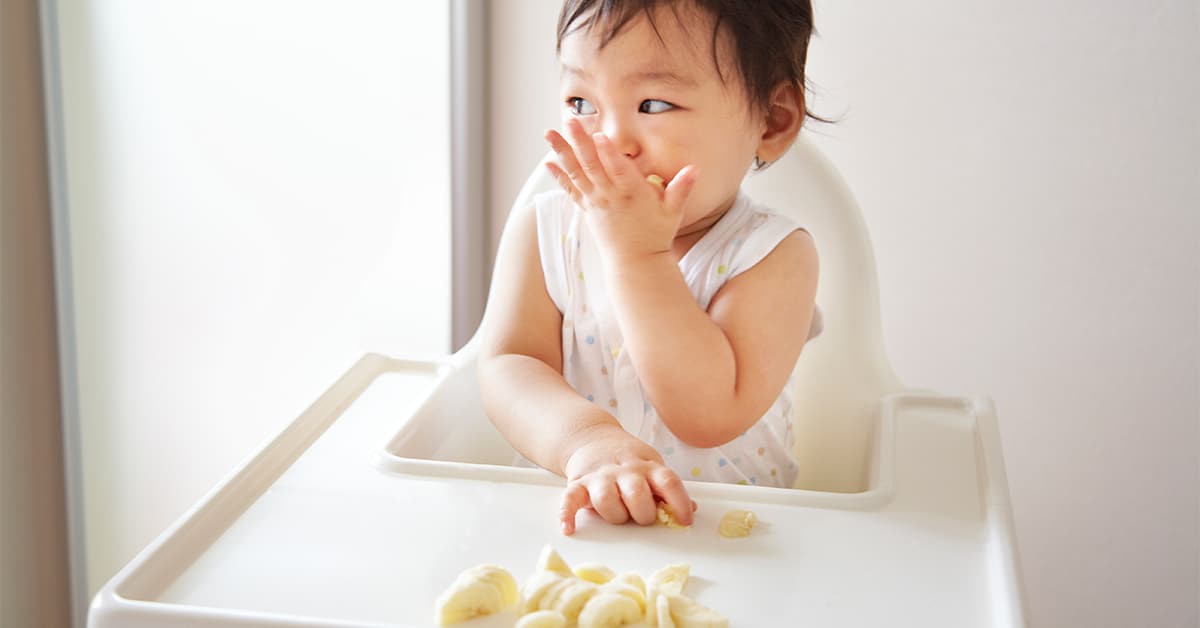 asian baby highchair eating bananas fruit 1200x628 facebook