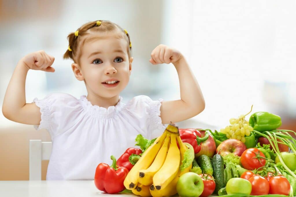 a beautiful girl eating fresh fruit