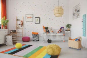 poufs on colorful rug in scandi baby s room interi 2021 08 26 15 45 34 utc(1)(1)
