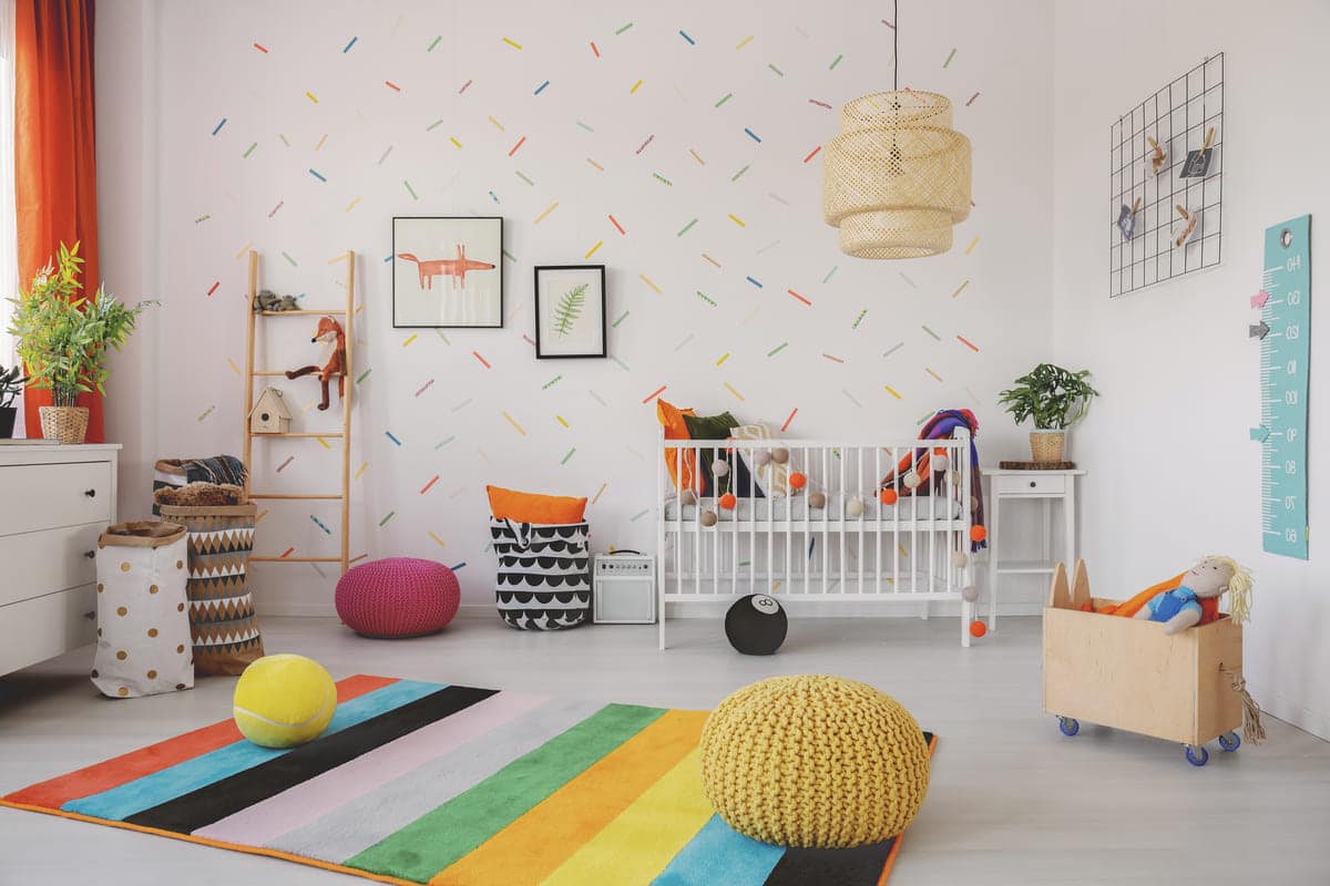poufs on colorful rug in scandi baby s room interi 2021 08 26 15 45 34 utc(1)(1)