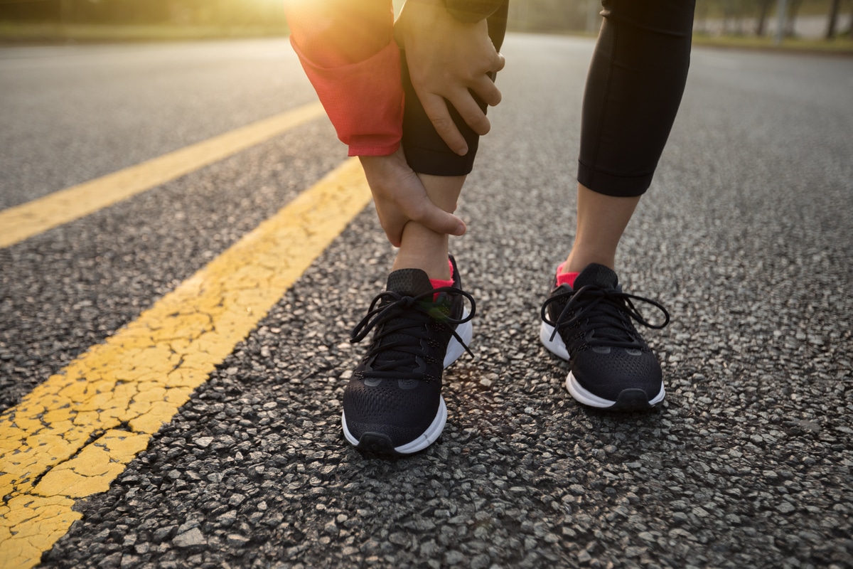 woman runner with injured leg