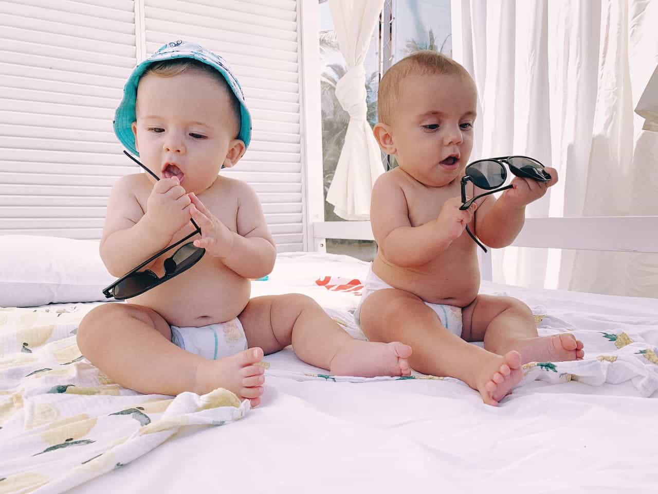 baby twins with sunglasses on beach 2022 08 01 04 55 41 utc(1)(1)