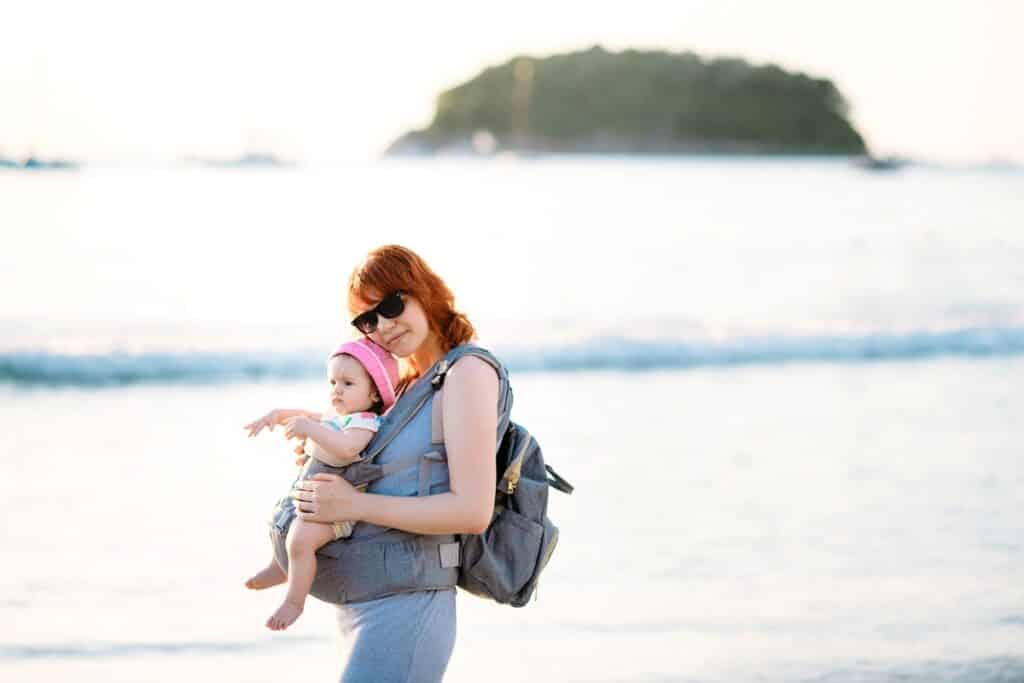 travel mum with infant baby in ergo back baby carr 2022 06 24 00 56 14 utc