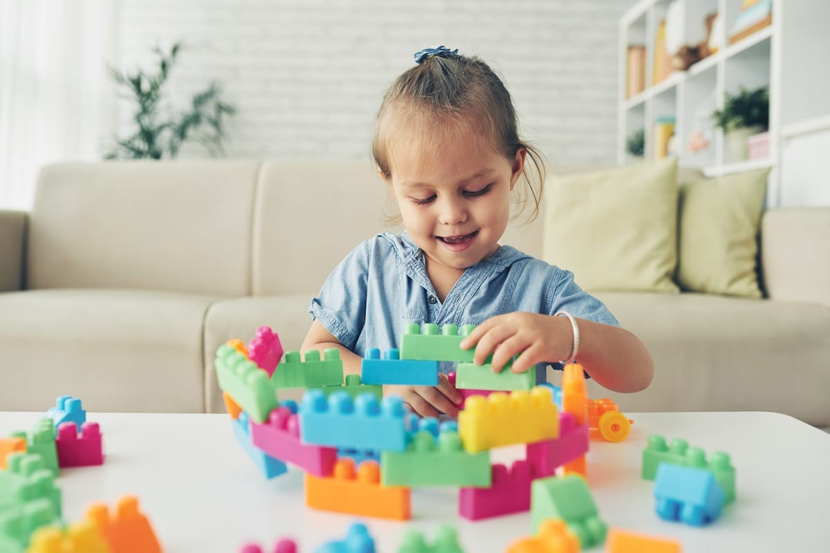 playing with construction blocks