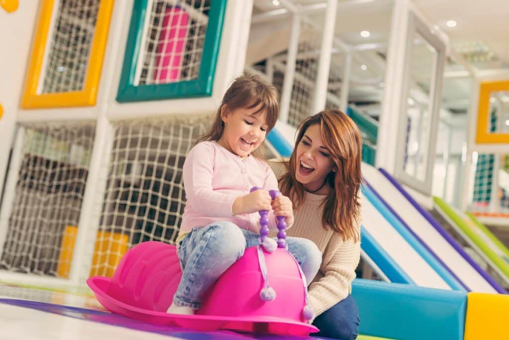 riding a pink caterpillar