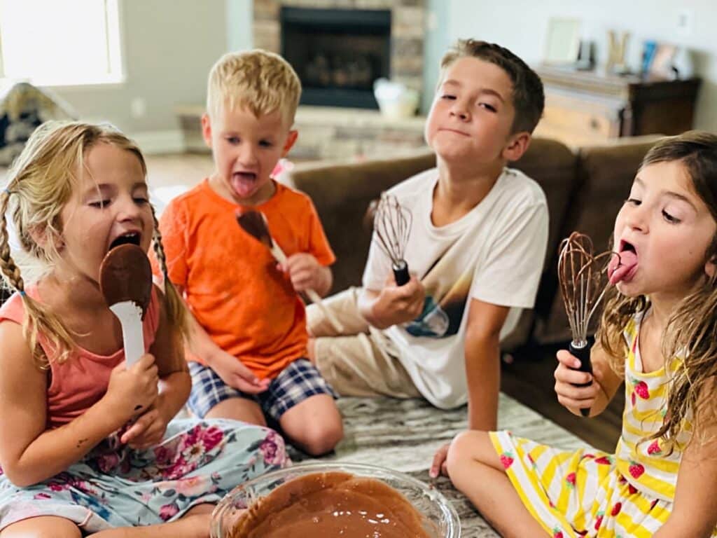 happy kids enjoying childhood licking cake batter 2022 11 07 07 34 40 utc(1)(1)