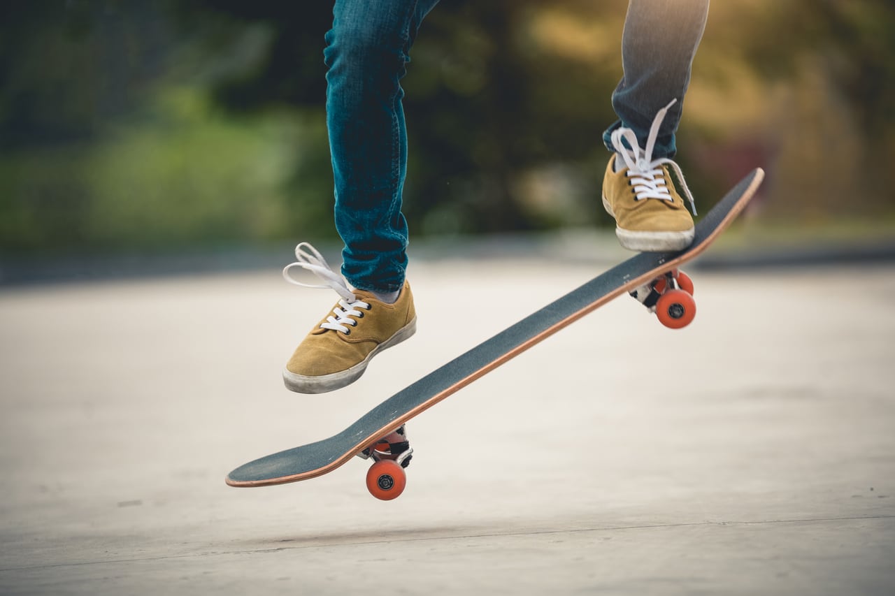 skateboarder skateboarding at morning outdoors