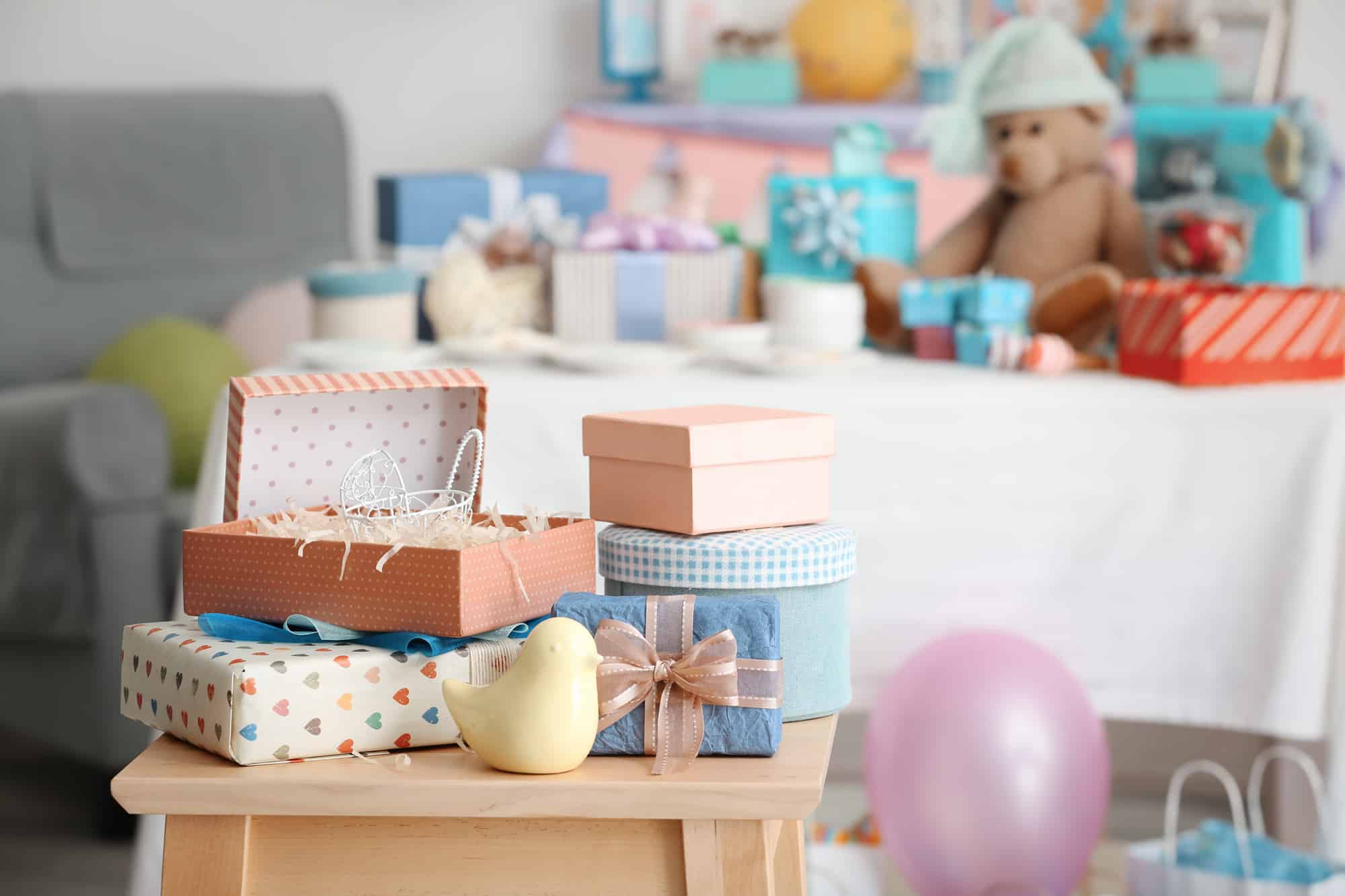 gifts for baby shower on stool indoors