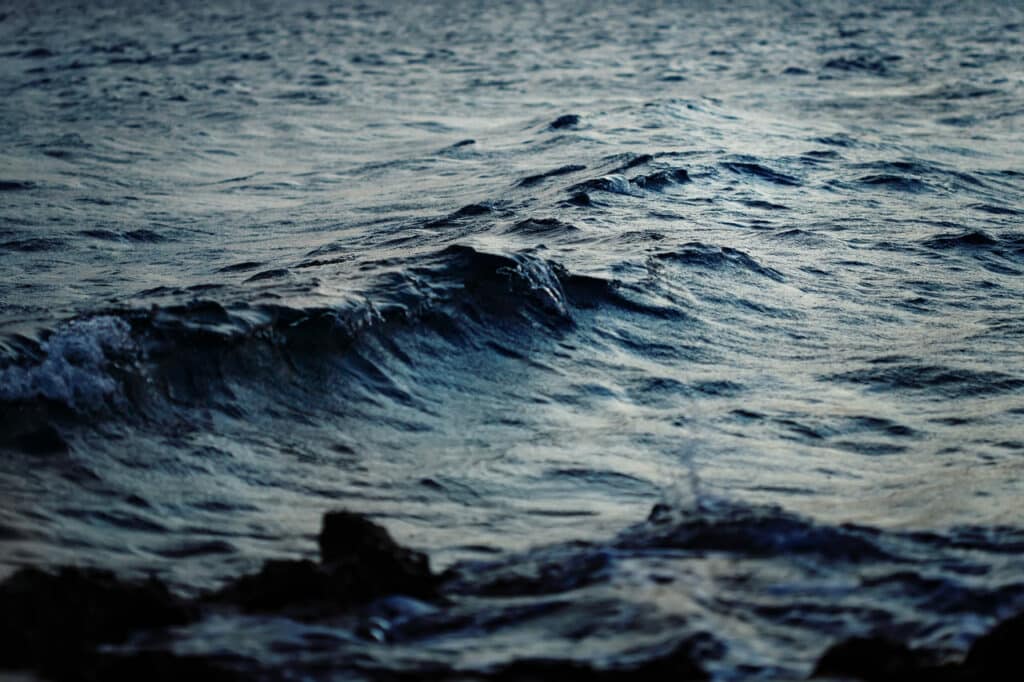 dark deep blue sea water with waves in twilight 2022 11 01 09 15 13 utc