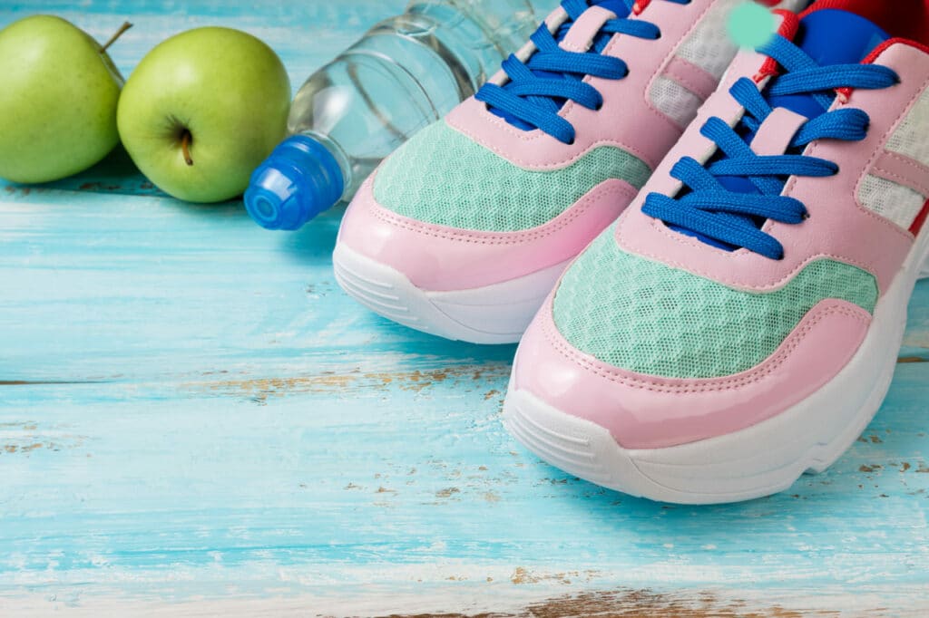 pink sport shoes bottle of water and green apples 2022 12 11 23 59 34 utc11 1024x682 - How to Make Your Shoes Last a Lifetime