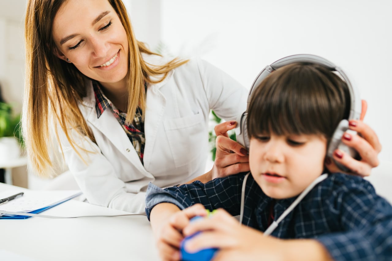 hearing test for children little boy doing a audiometry test