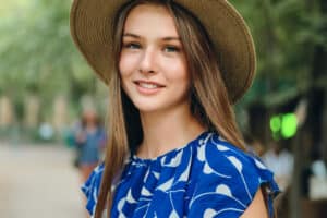 portrait of pretty smiling girl in blue dress and 2022 02 02 04 51 56 utc