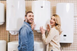 smiling boyfriend and girlfriend touching boiler i 2022 12 16 15 20 30 utc(1)(1)