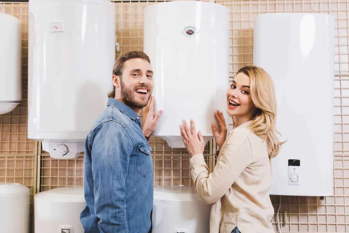 smiling boyfriend and girlfriend touching boiler i 2022 12 16 15 20 30 utc(1)(1)
