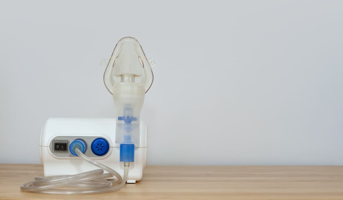the nebulizer for inhalation stands on a table aga 2022 11 14 04 59 47 utc(1)(1)