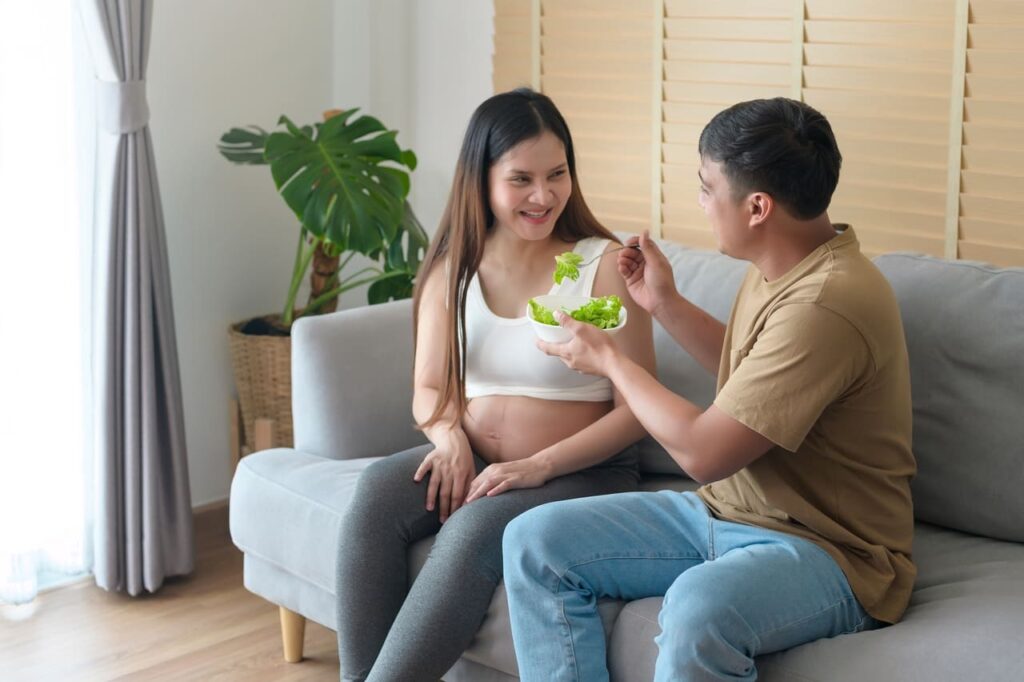 2 month pregnant woman having salad at home healthc 2023 05 16 16 26 38 utc