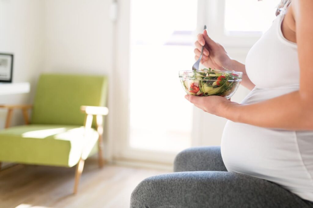 3 months pregnant woman eating healthy food 2021 08 27 09 59 21 utc