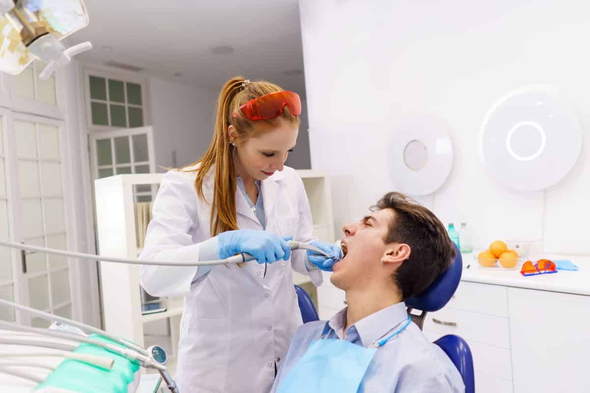 dentist using tool dental drill on patient 2022 01 20 19 48 07 utc(1)(1)