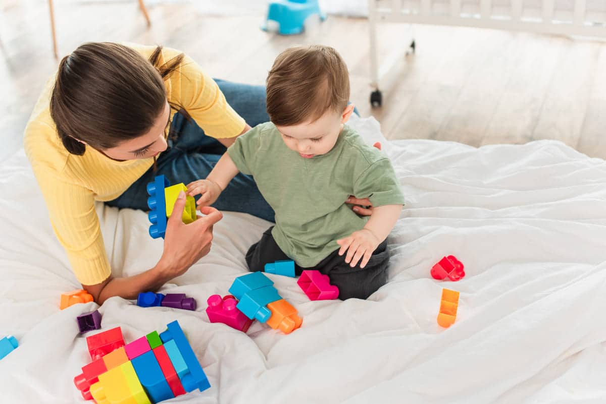 high angle view of mother and son playing building 2023 10 06 19 39 51 utc(1)(1)