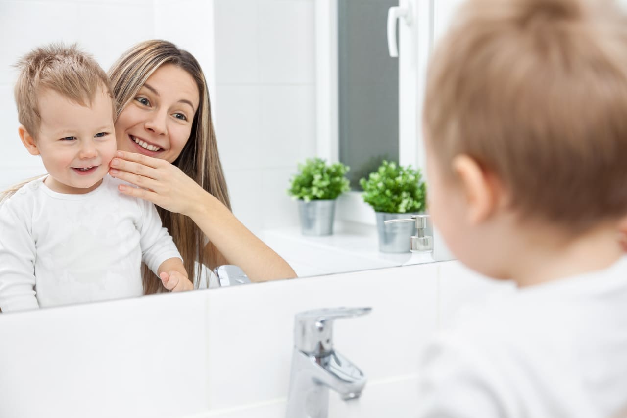 mom teaching her son how to wash his face 2021 08 26 22 39 30 utc(1)(1)