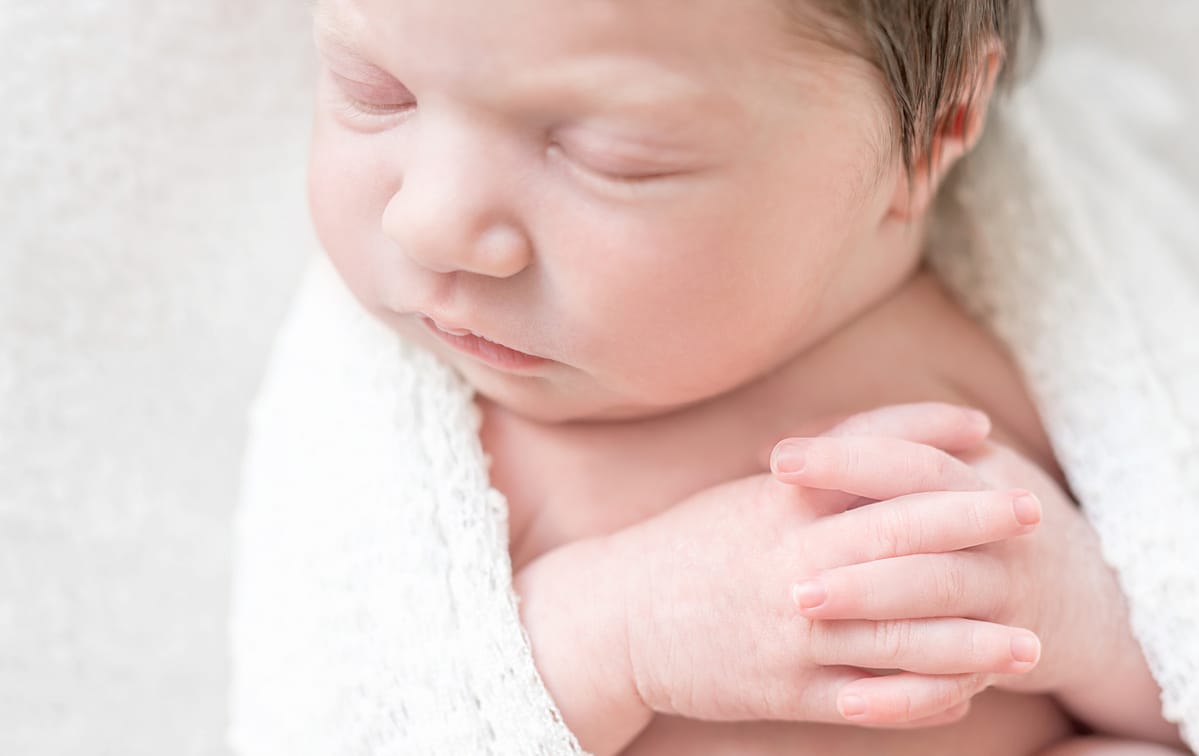 soft skin of the newborn baby sleeping, closeup