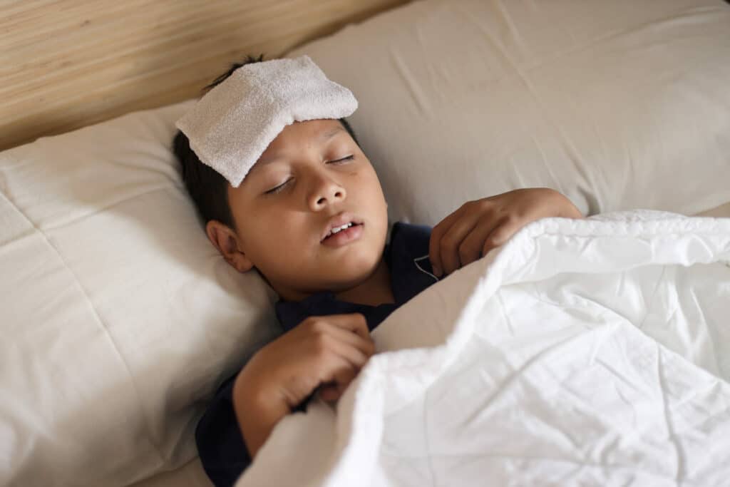 asian little boy have a fever kid sleep on bed 2022 11 16 10 59 41 utc(1)(1)