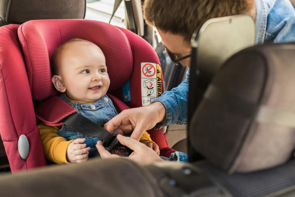 father fasten his baby in car seat 2021 09 02 10 31 03 utc(1)(1)