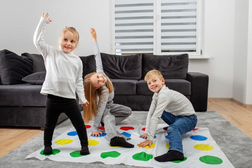 group of children playing twister game and having 2022 12 15 01 15 56 utc(1)(1)