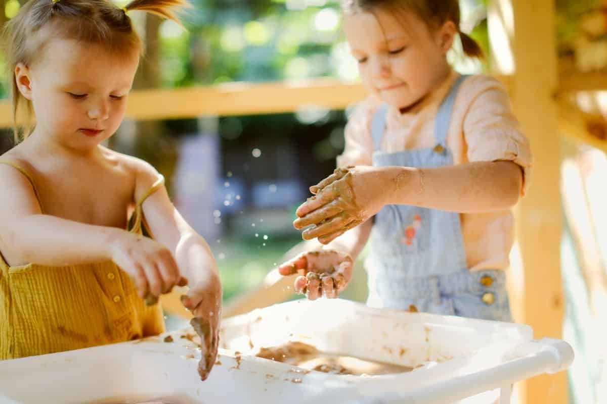 happy children play with sand and water in sensory 2022 11 11 06 47 30 utc(1)(2)