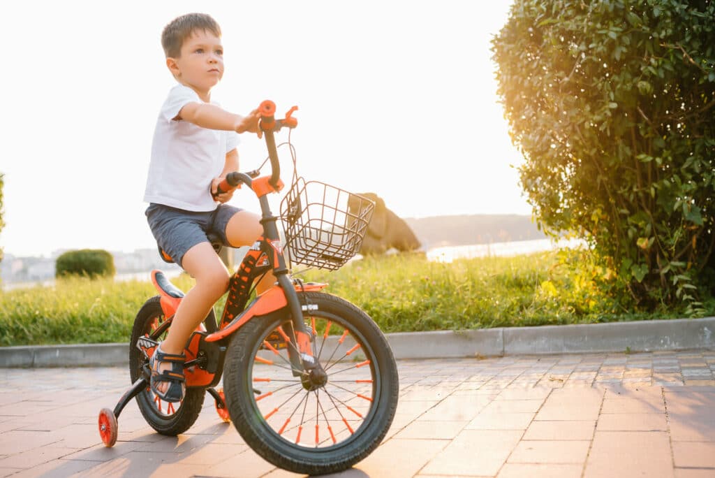little boy learns to ride a bike in the park happ 2023 11 06 09 36 46 utc(1)(1)