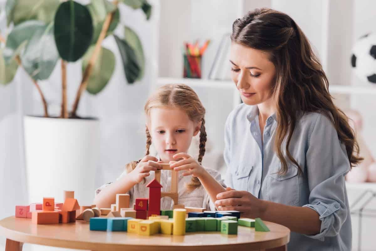 psychologist playing blocks with little child with 2022 12 16 20 46 38 utc(1)(1)