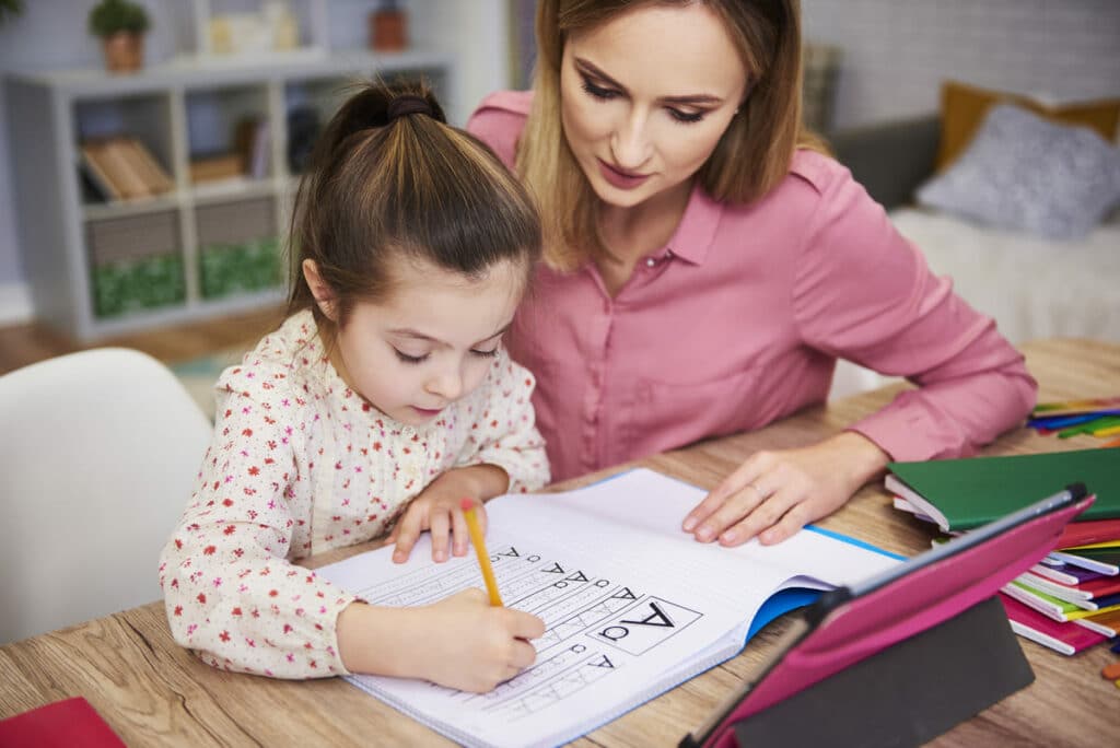 young woman helping girl with homework 2021 08 27 09 17 08 utc(1)(1)