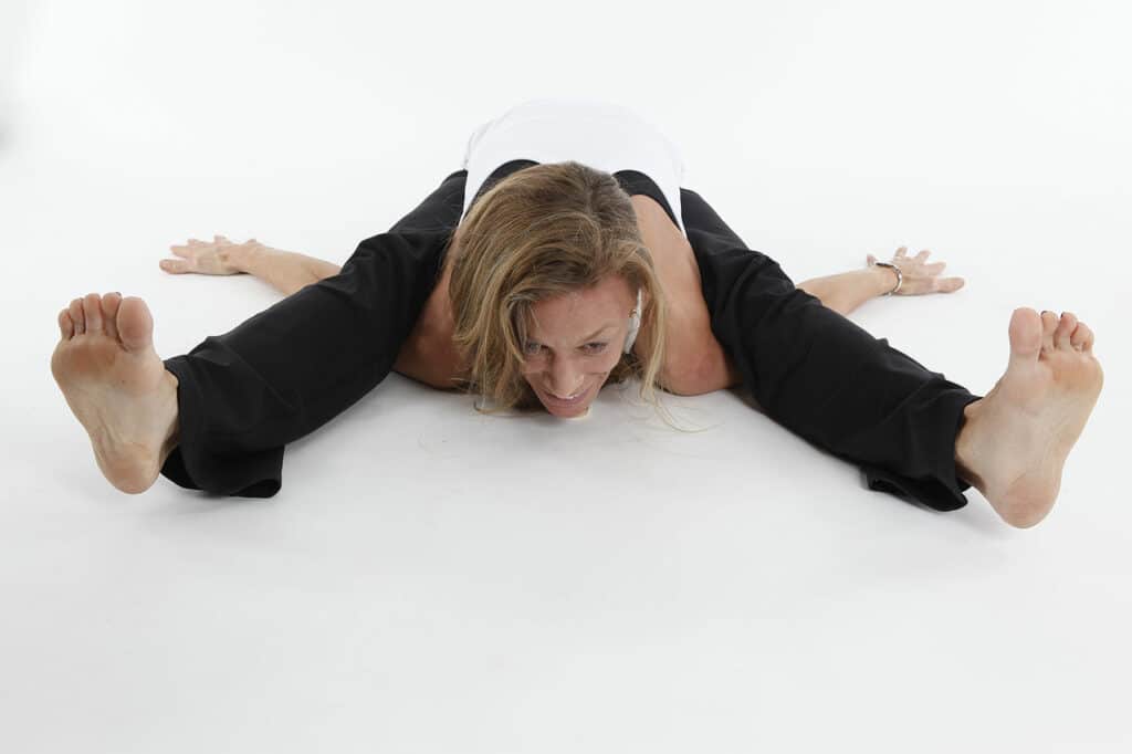 1280px kūrmāsana tortoise pose with hands facing back