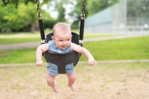 baby girl on a swing at the park on a summer day 2023 11 27 05 07 55 utc(1)(2)