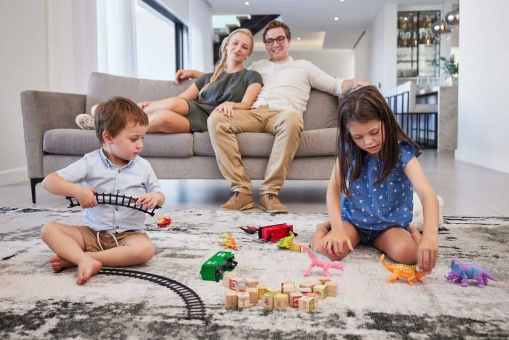 family home parents and children with toys on car 2023 11 27 05 08 45 utc(1)
