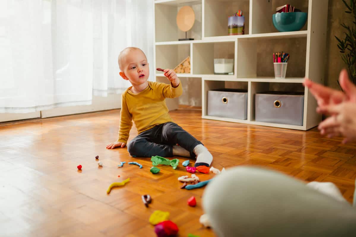 toddler child playing with modeling clay in a kind 2025 04 01 13 10 07 utc(1)