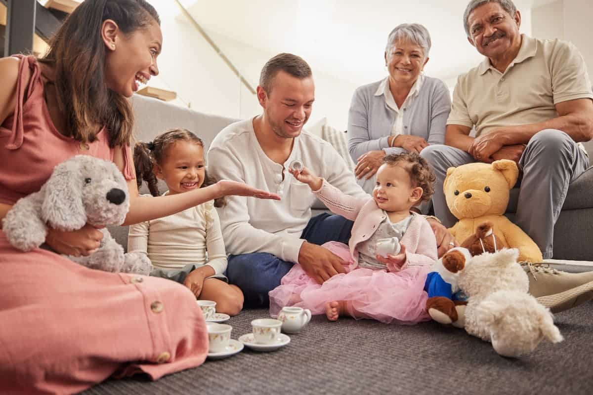 big family portrait in kids room with teddy bear t 2025 04 06 13 00 00 utc(2)