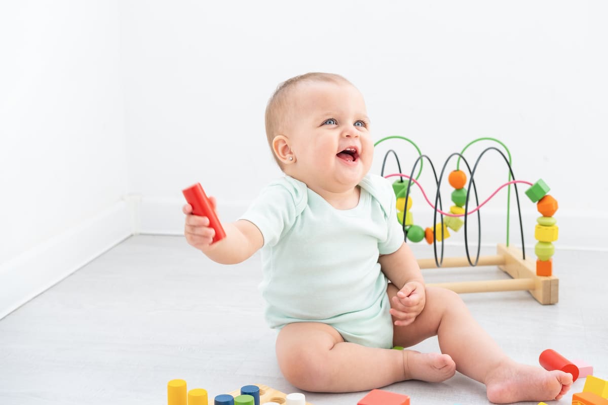 funny baby girl playing with colorful toys on flo 2025 01 10 03 25 49 utc(1)